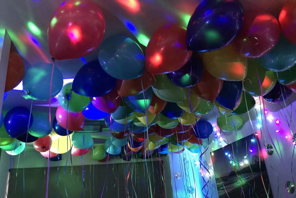 Balloons floating inside the room